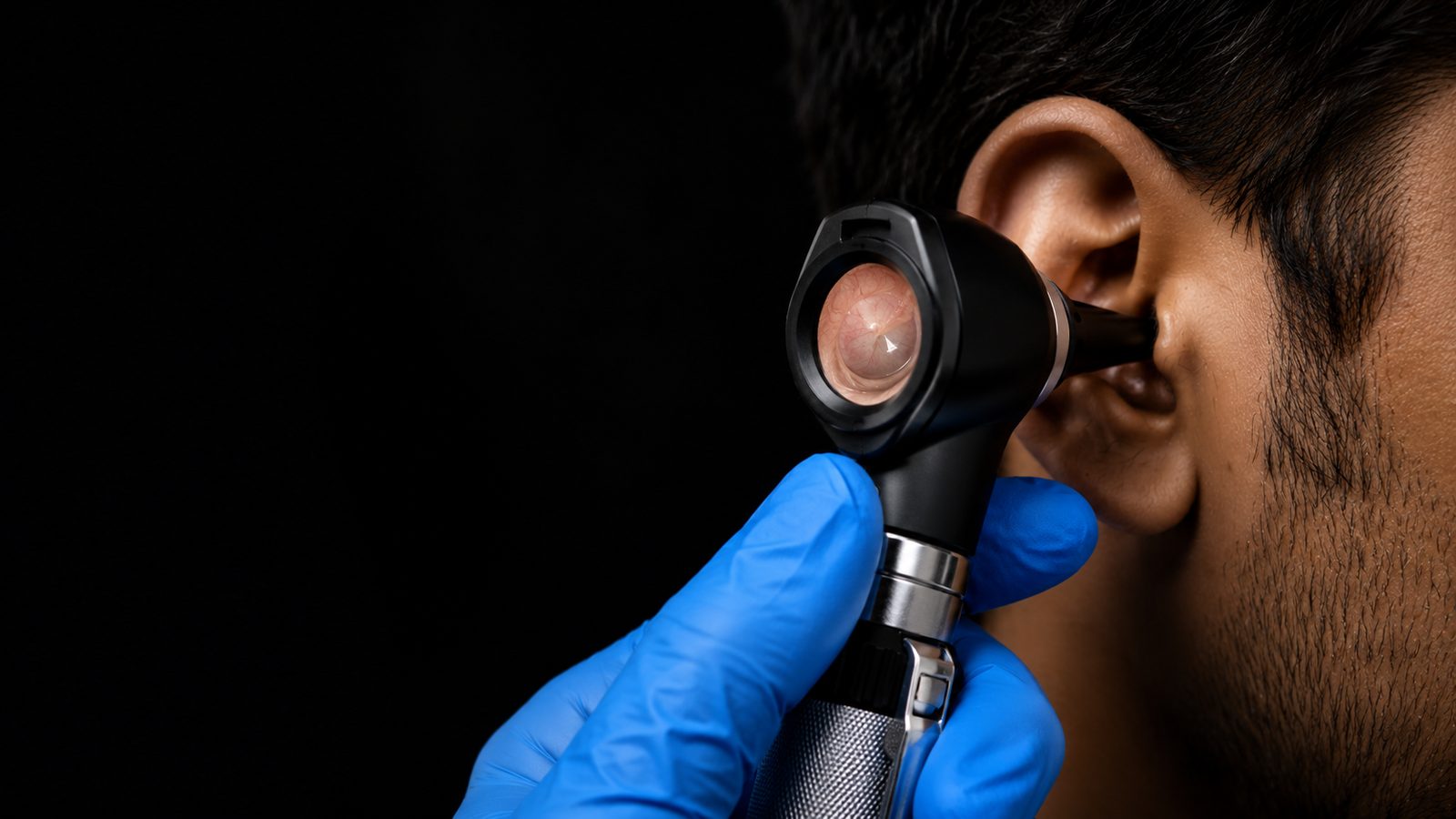Otoscope examination of the ear